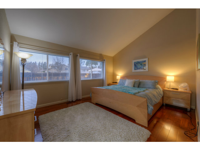 3311 Veracruz Drive San Ramon, CA 94583 - Photo 8 of 21 a bedroom with a bed and wooden floor