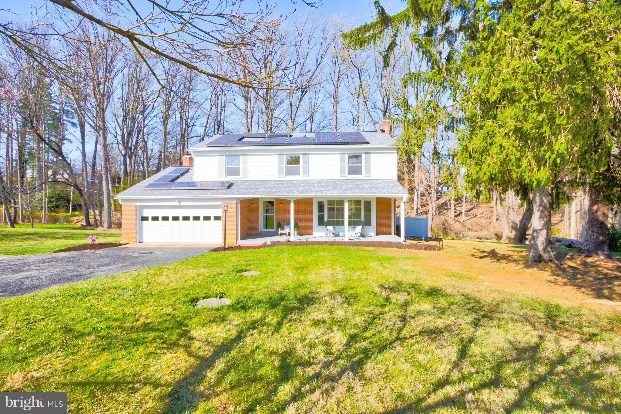 1320 Denby Road Towson, MD 21286 - Photo 3 of 39 a front view of a house with a yard