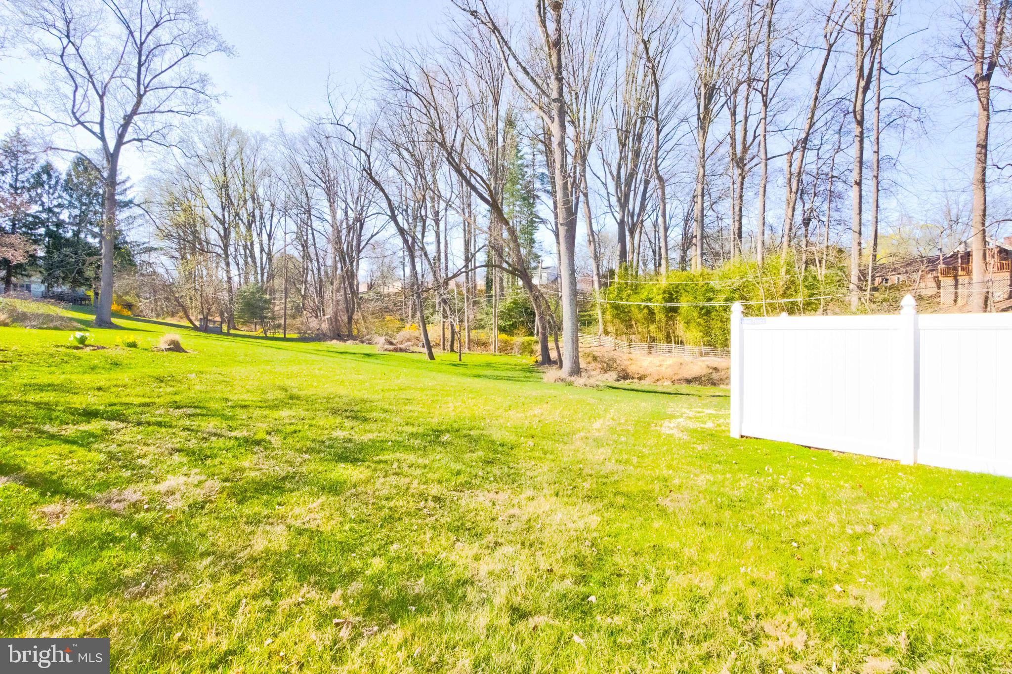 1320 Denby Road Towson, MD 21286 - Photo 36 of 39 a view of an swimming pool with an outdoor space and seating area