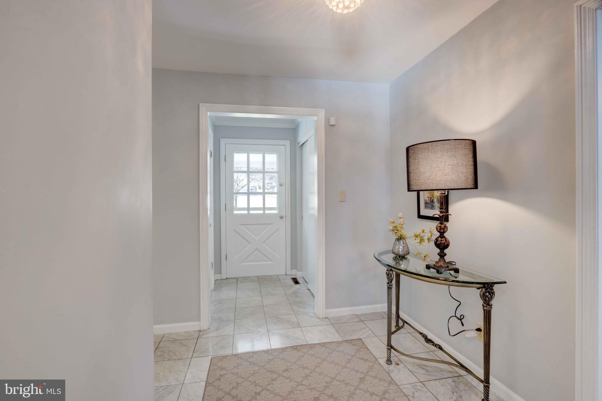 1320 Denby Road Towson, MD 21286 - Photo 6 of 39 a room with a table and chairs