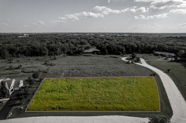 a view of a swimming pool with an outdoor seating