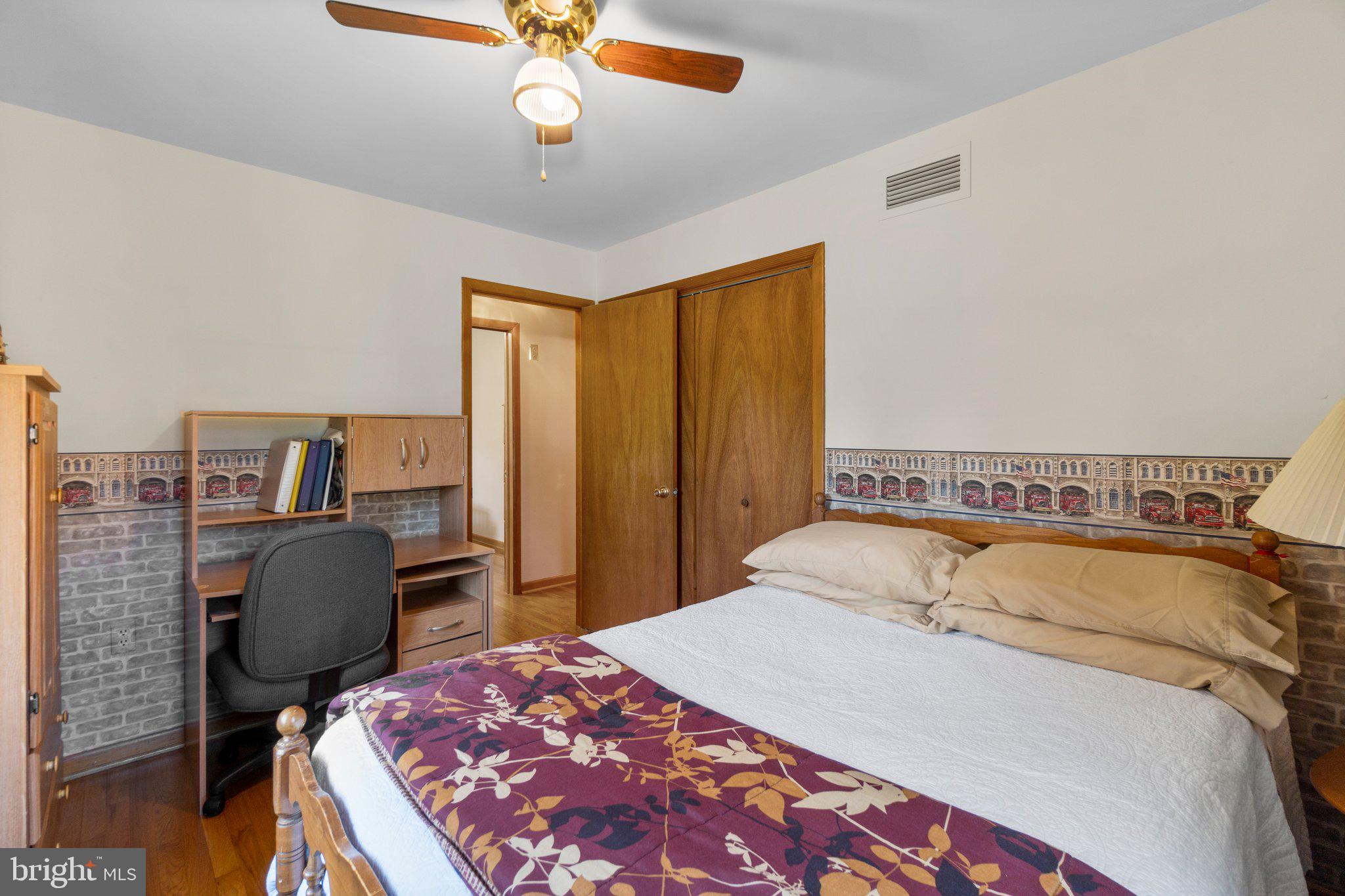 8008 Meadowview Drive Frederick, MD 21702 - Photo 22 of 42 a bedroom with a bed and chair