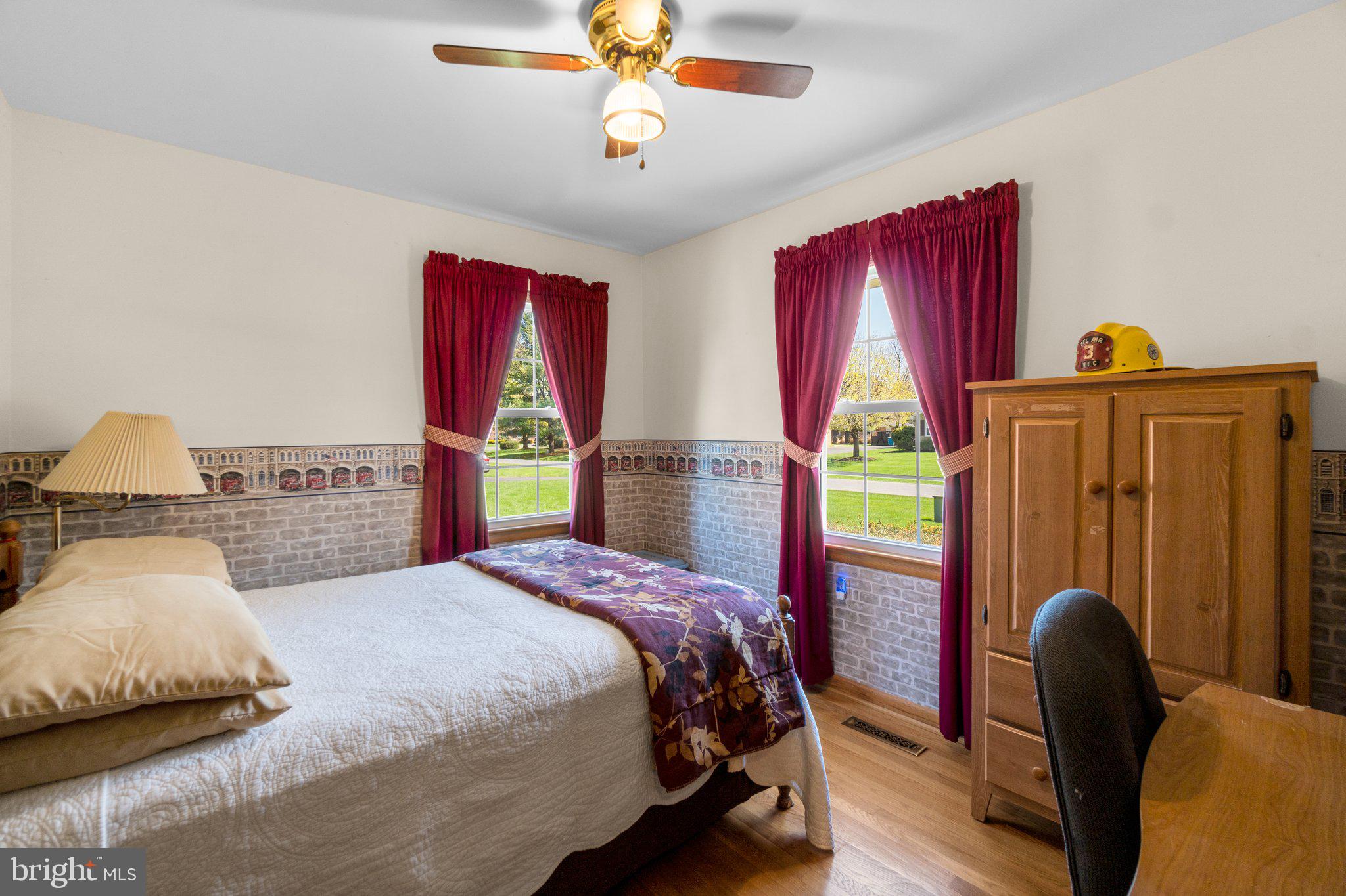 8008 Meadowview Drive Frederick, MD 21702 - Photo 23 of 42 a bedroom with bed and window