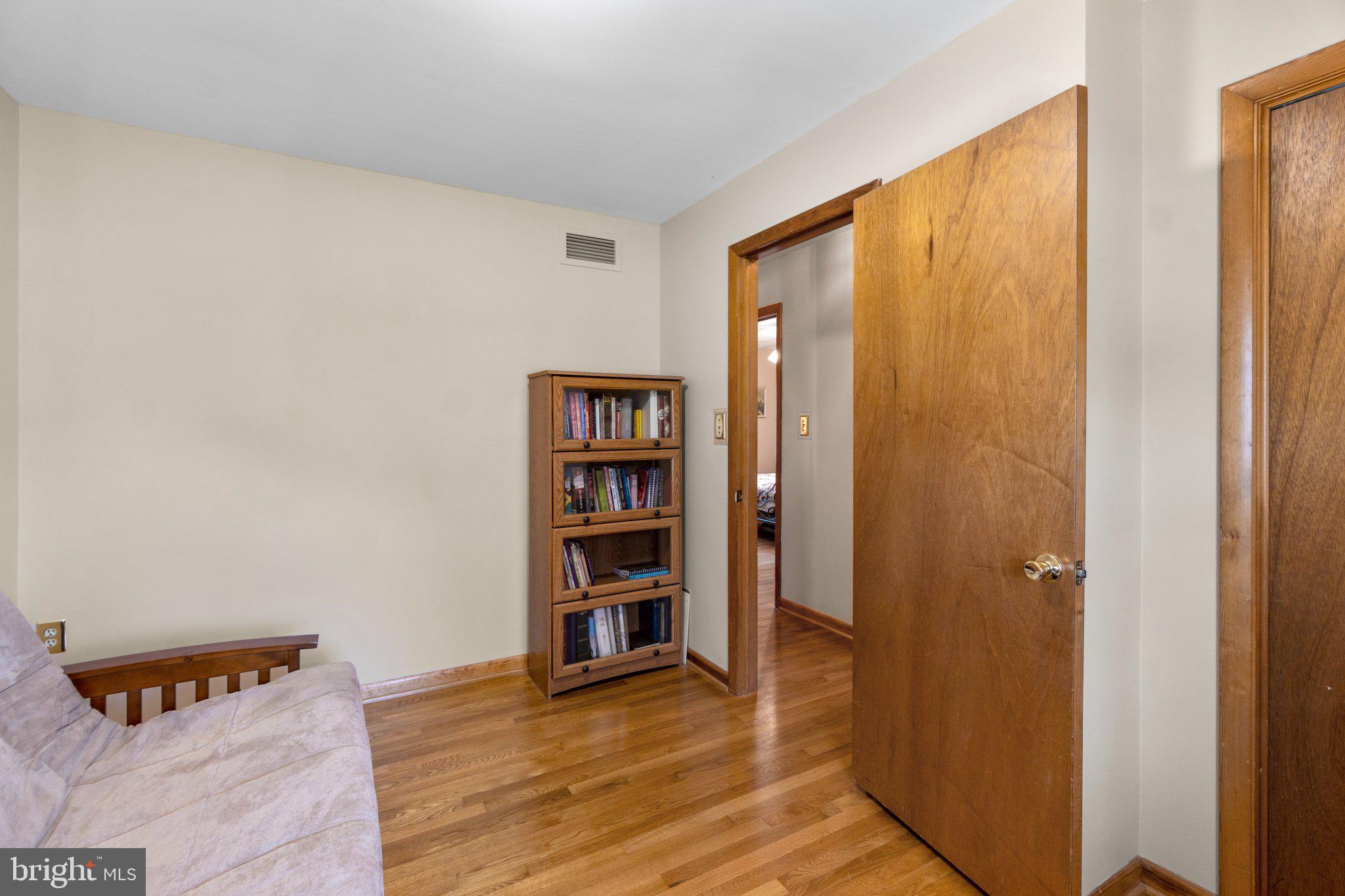 8008 Meadowview Drive Frederick, MD 21702 - Photo 26 of 42 an empty room with wooden floor and closet