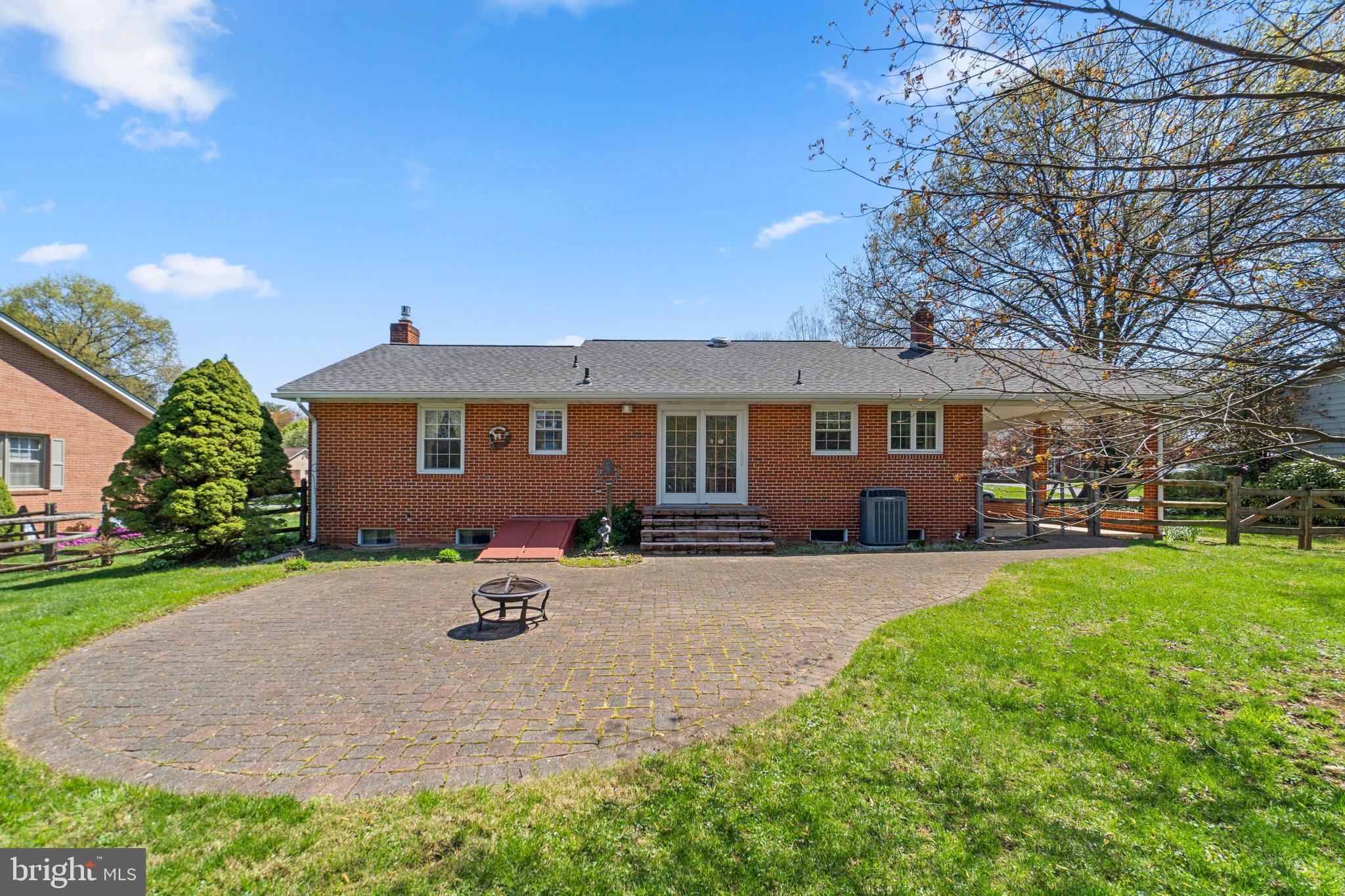 8008 Meadowview Drive Frederick, MD 21702 - Photo 41 of 42 front view of a house with a patio