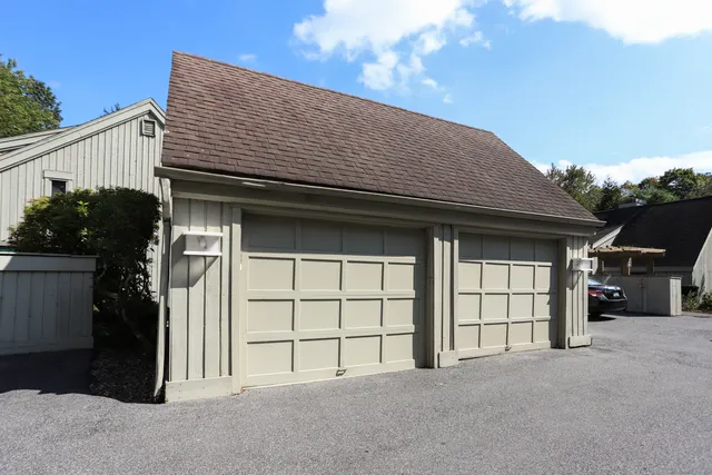 a view of a house with a garage