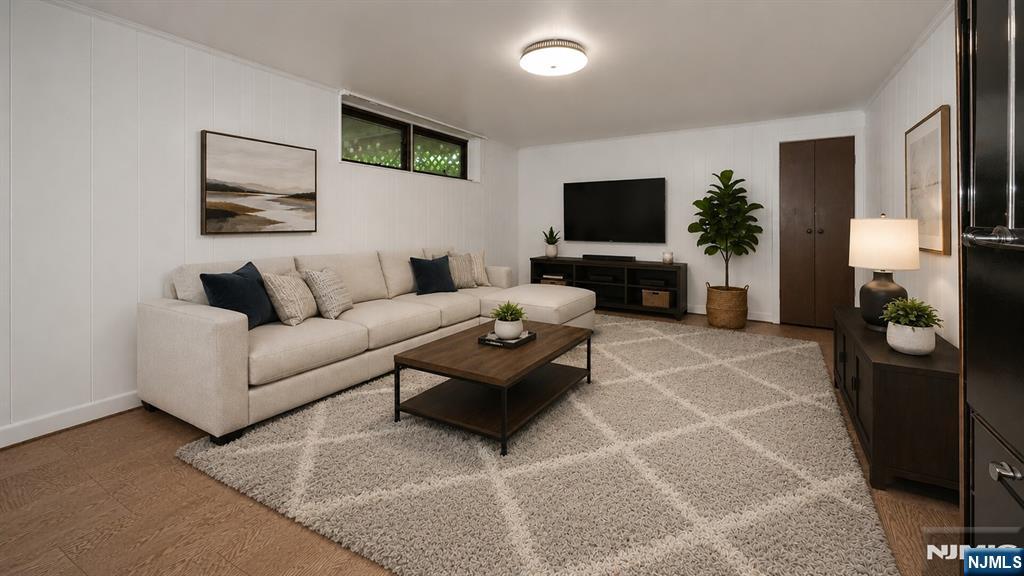 277 French Hill Road Wayne, NJ 07470 - Photo 12 of 28 a living room with furniture and a flat screen tv