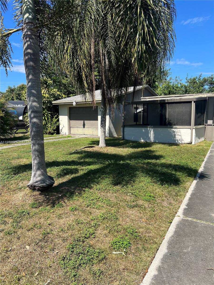 14435 Southwest 289th Street Homestead, FL 33033 - Photo 2 of 18 a view of a house with backyard