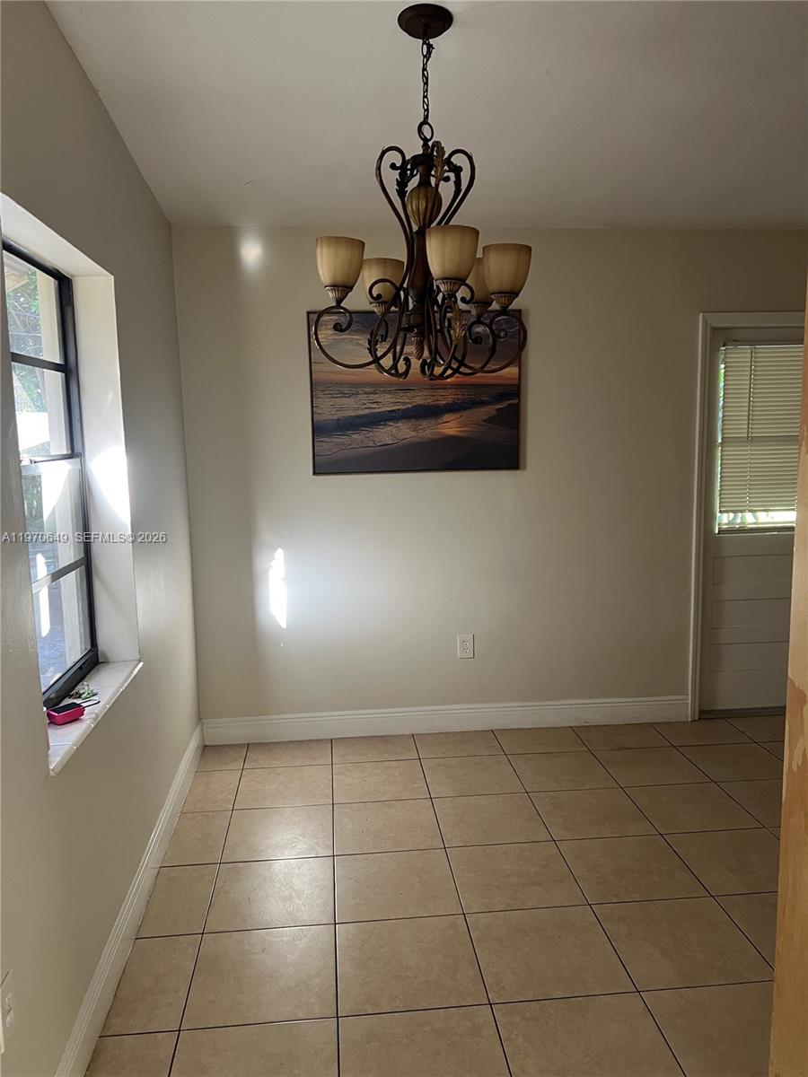 14435 Southwest 289th Street Homestead, FL 33033 - Photo 5 of 18 a view of entryway with kitchen