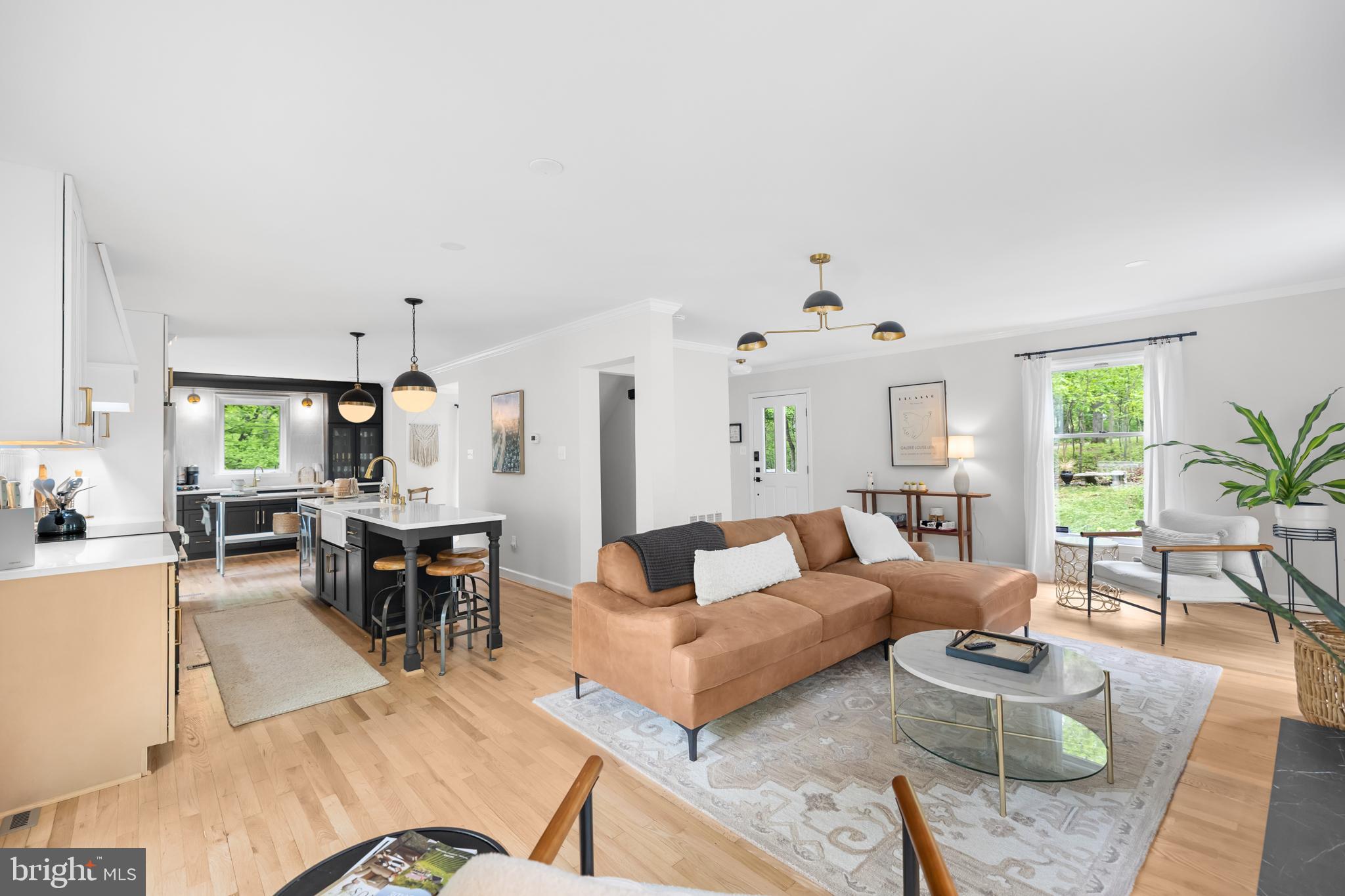 20808 Wild Goose Lane Leesburg, VA 20175 - Photo 13 of 86 a living room with furniture kitchen view and a large window