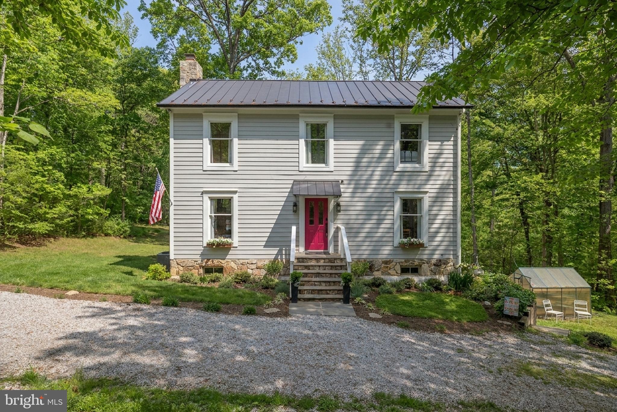 20808 Wild Goose Lane Leesburg, VA 20175 - Photo 2 of 86 a front view of a house with a yard