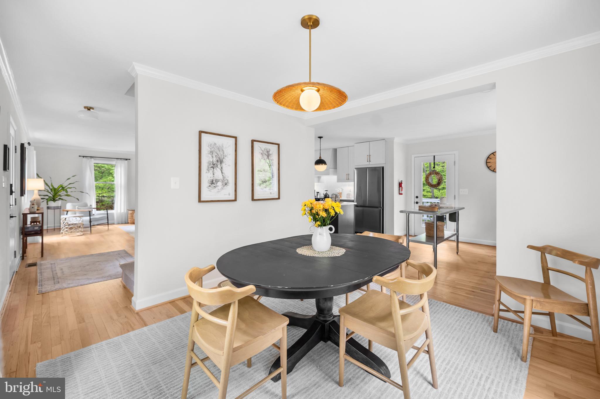 20808 Wild Goose Lane Leesburg, VA 20175 - Photo 31 of 86 a view of a dining room with furniture and wooden floor