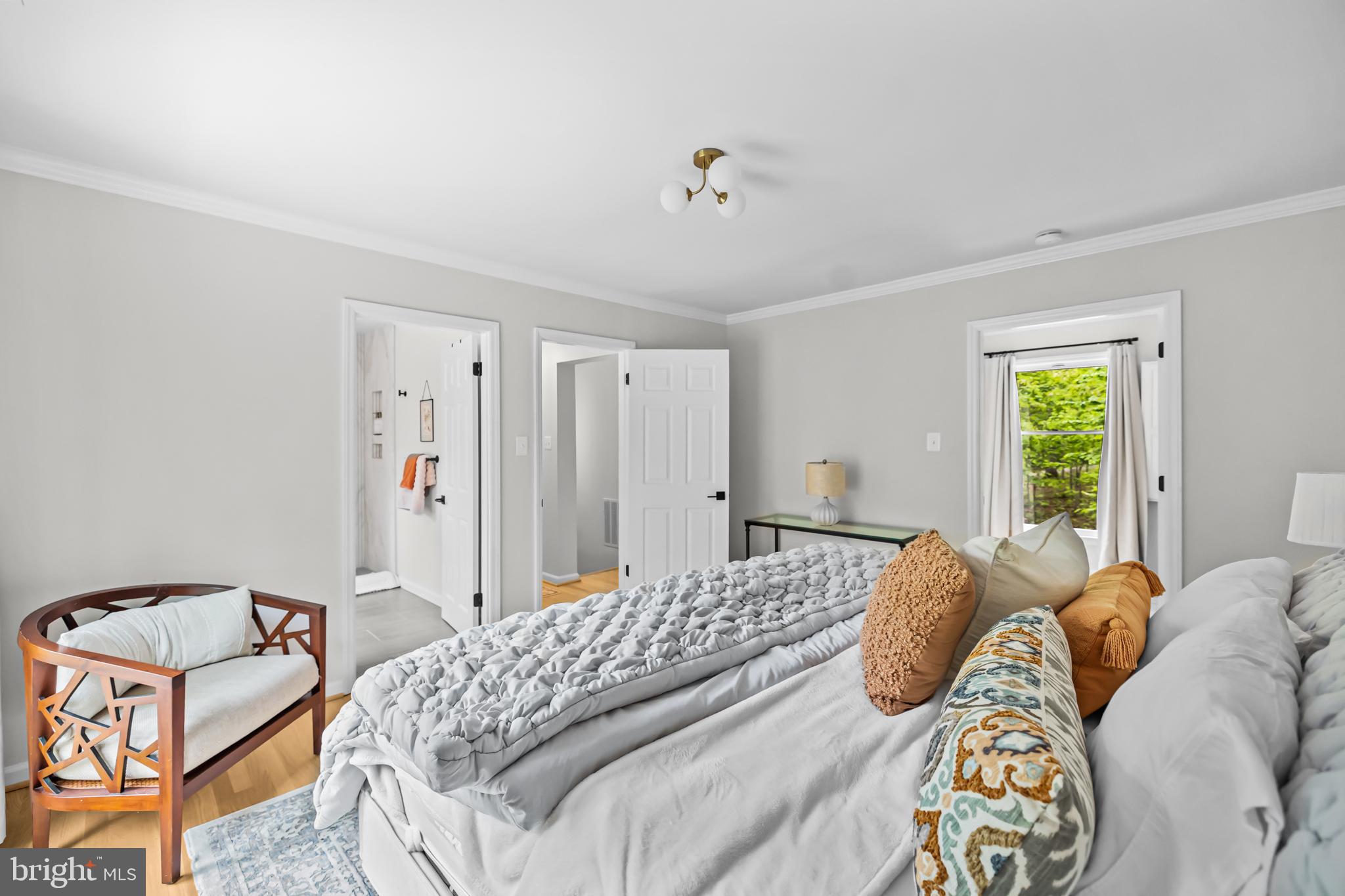 20808 Wild Goose Lane Leesburg, VA 20175 - Photo 37 of 86 a bedroom with a bed and a window