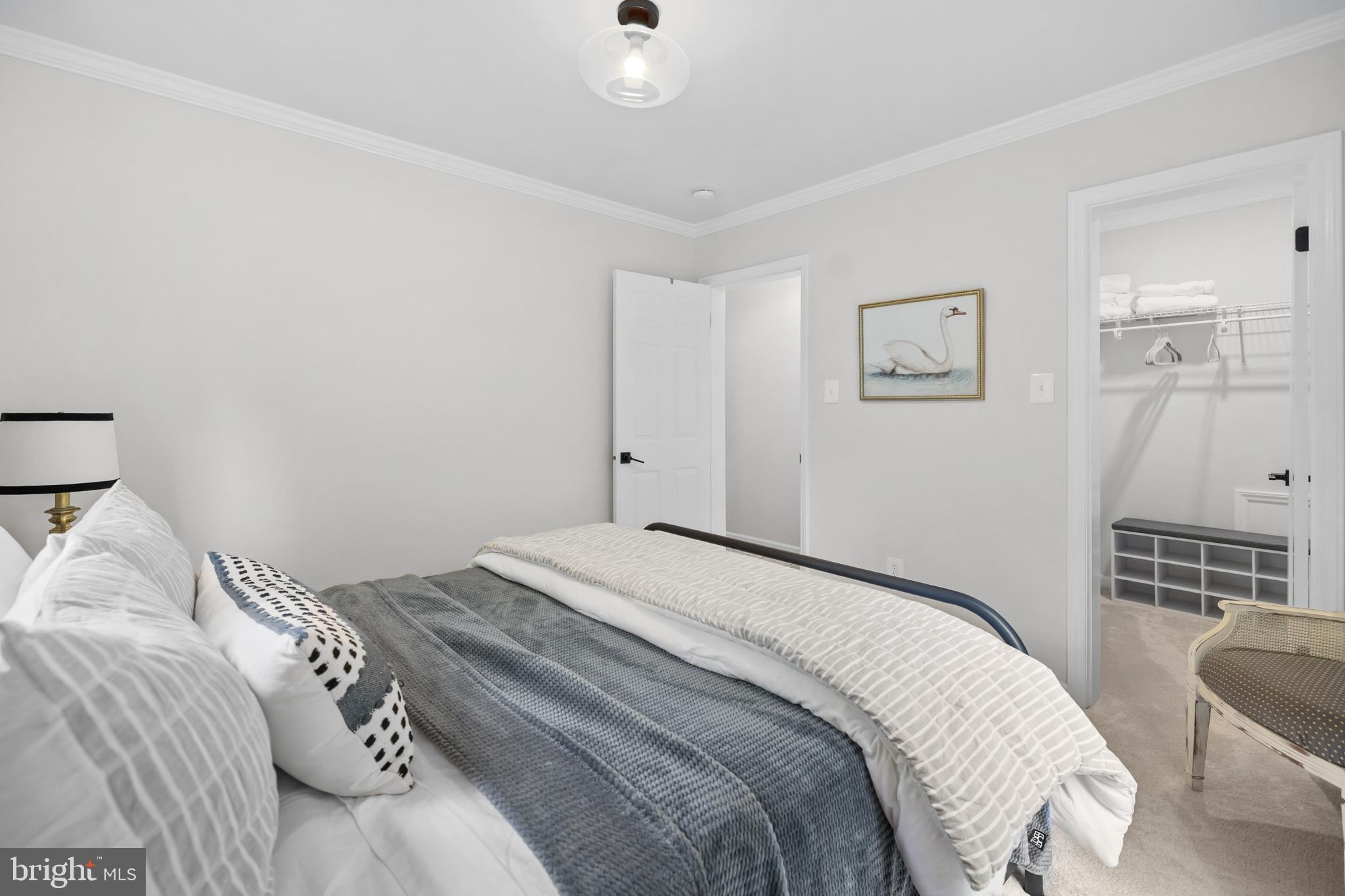 20808 Wild Goose Lane Leesburg, VA 20175 - Photo 45 of 86 a bedroom with a bed and a window