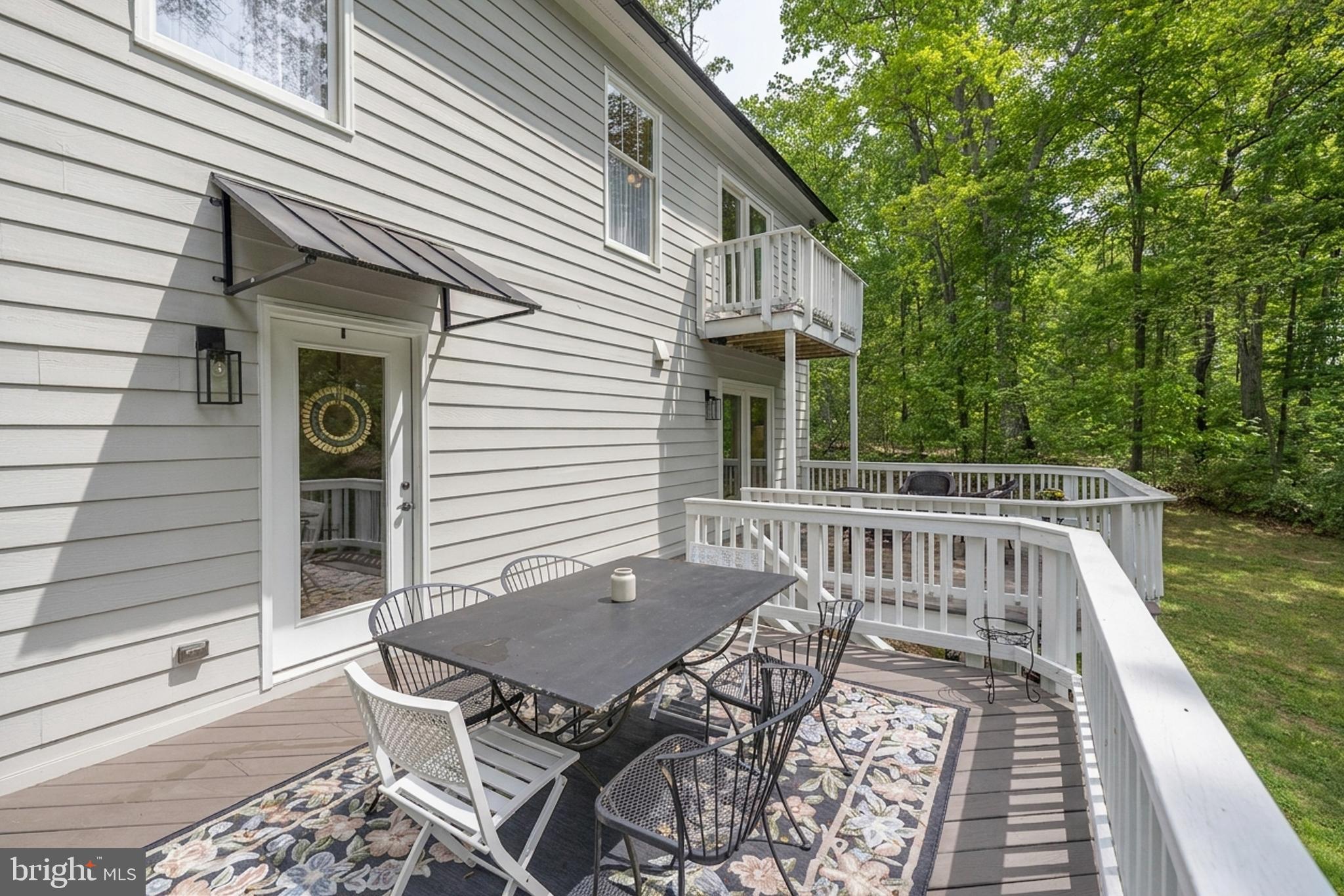 20808 Wild Goose Lane Leesburg, VA 20175 - Photo 63 of 86 a view of backyard with a patio and furniture