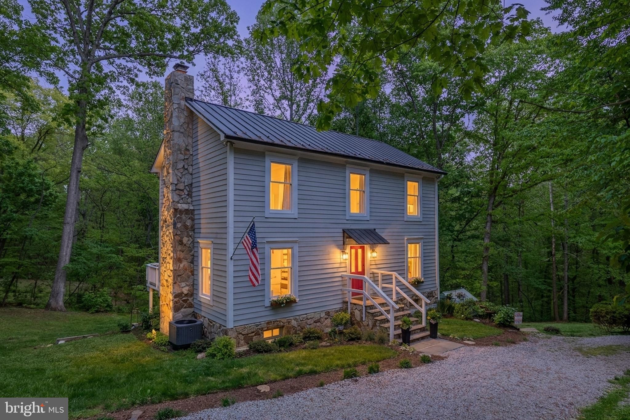 20808 Wild Goose Lane Leesburg, VA 20175 - Photo 74 of 86 a front view of a house with garden