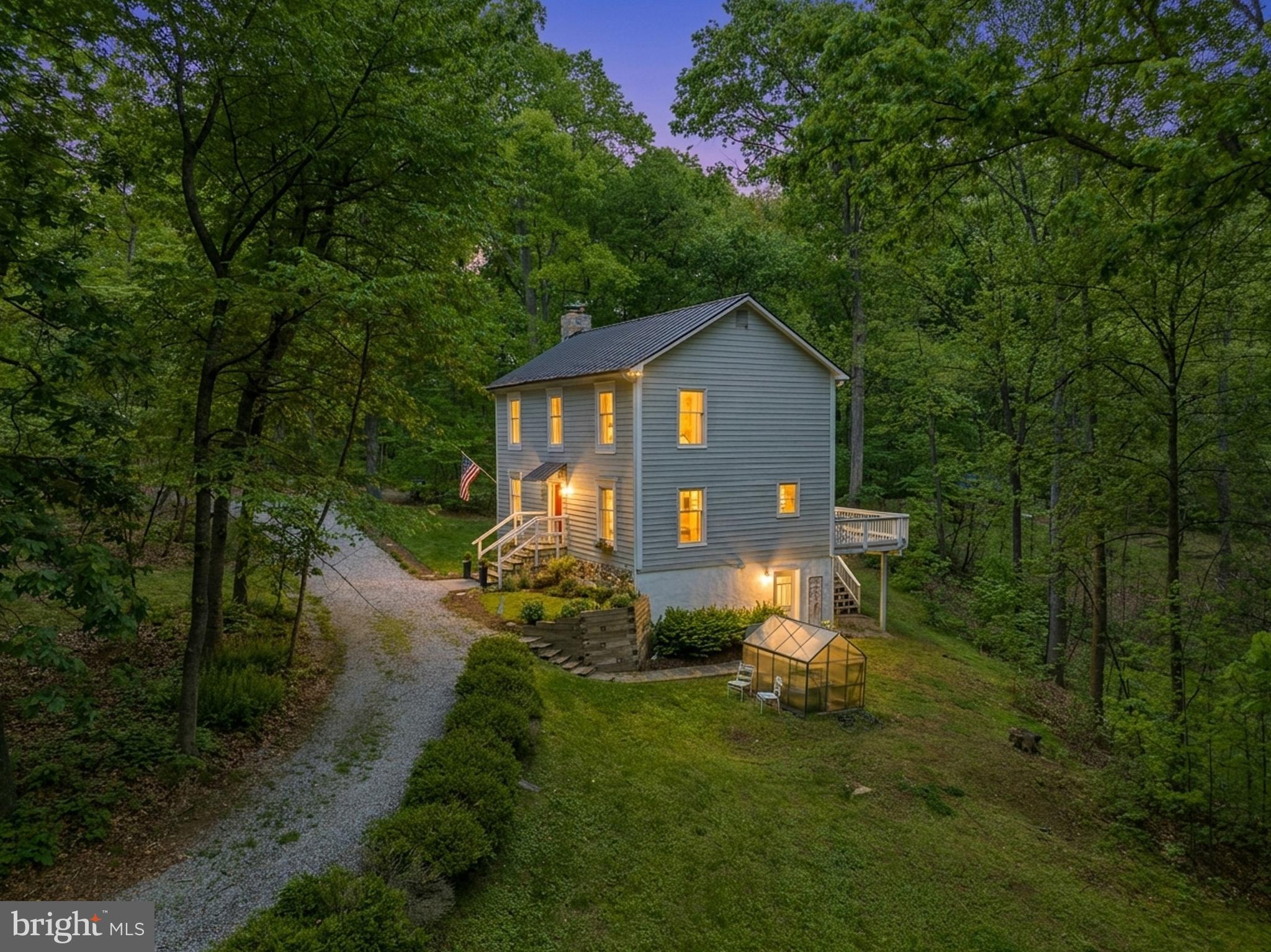 20808 Wild Goose Lane Leesburg, VA 20175 - Photo 77 of 86 a view of a small house with a yard