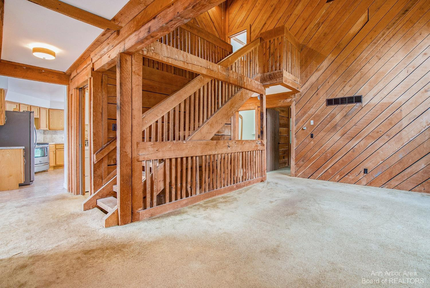 19350 Ivey Road Chelsea, MI 48118 - Photo 5 of 34 Two story great room with balcony.