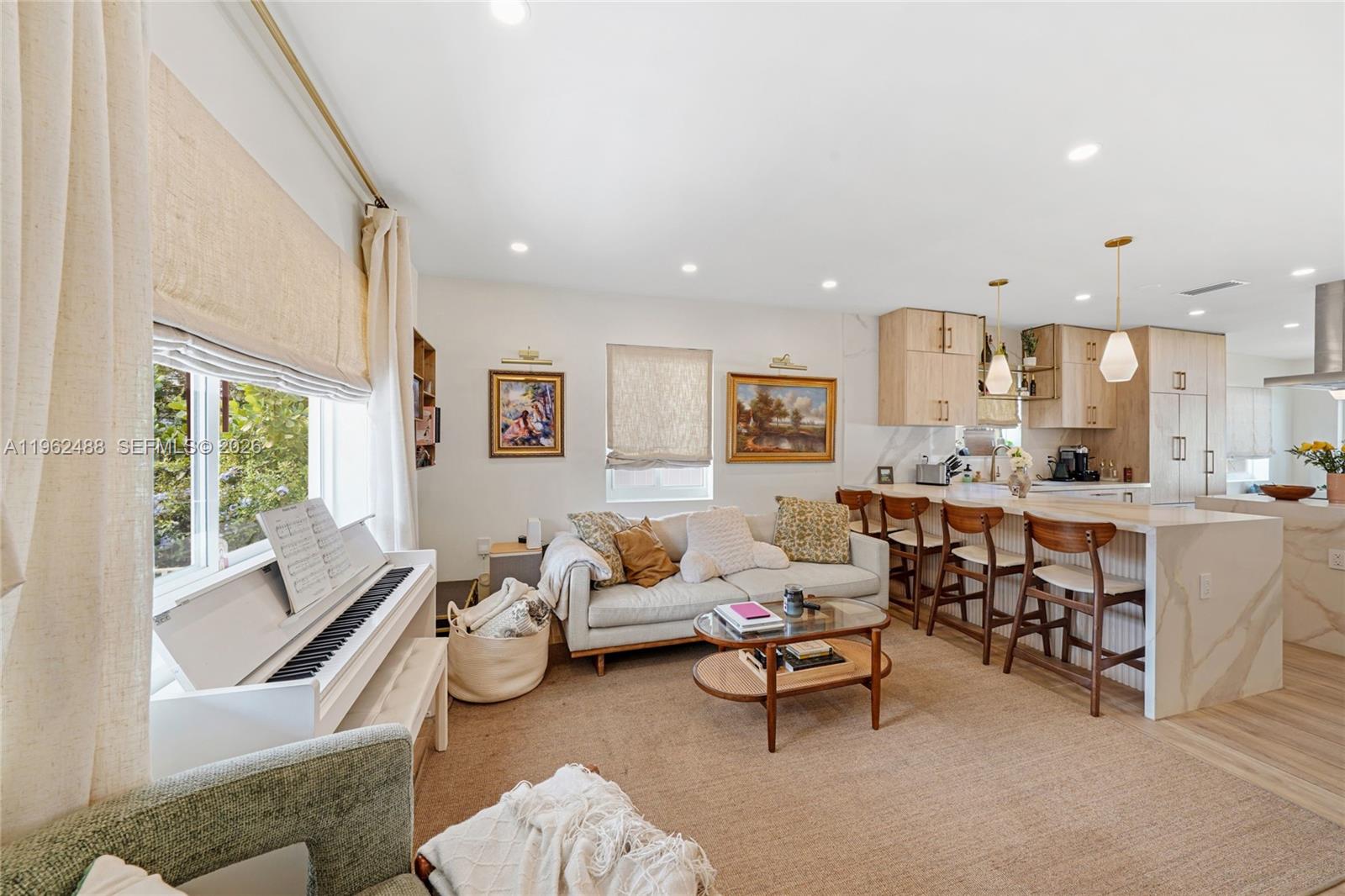 1737 Southwest 11th Street Miami, FL 33135 - Photo 11 of 30 a living room with furniture and a large window