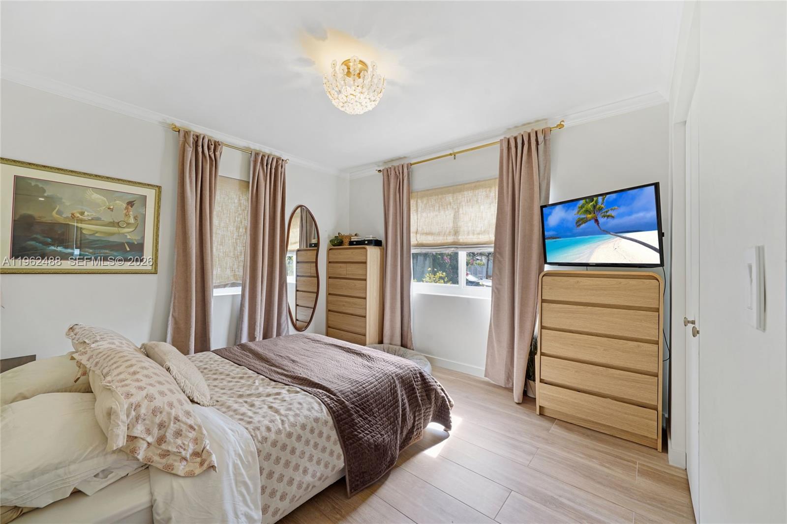 1737 Southwest 11th Street Miami, FL 33135 - Photo 14 of 30 a bedroom with a bed and a window