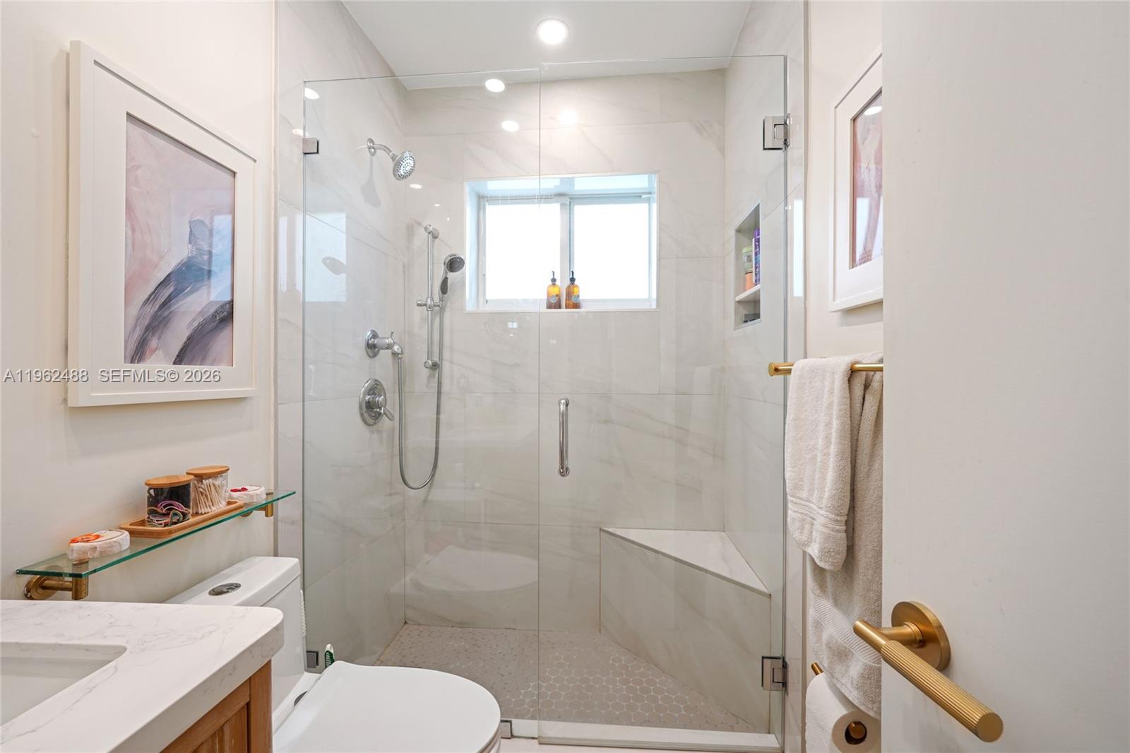 1737 Southwest 11th Street Miami, FL 33135 - Photo 18 of 30 a bathroom with a toilet sink and shower