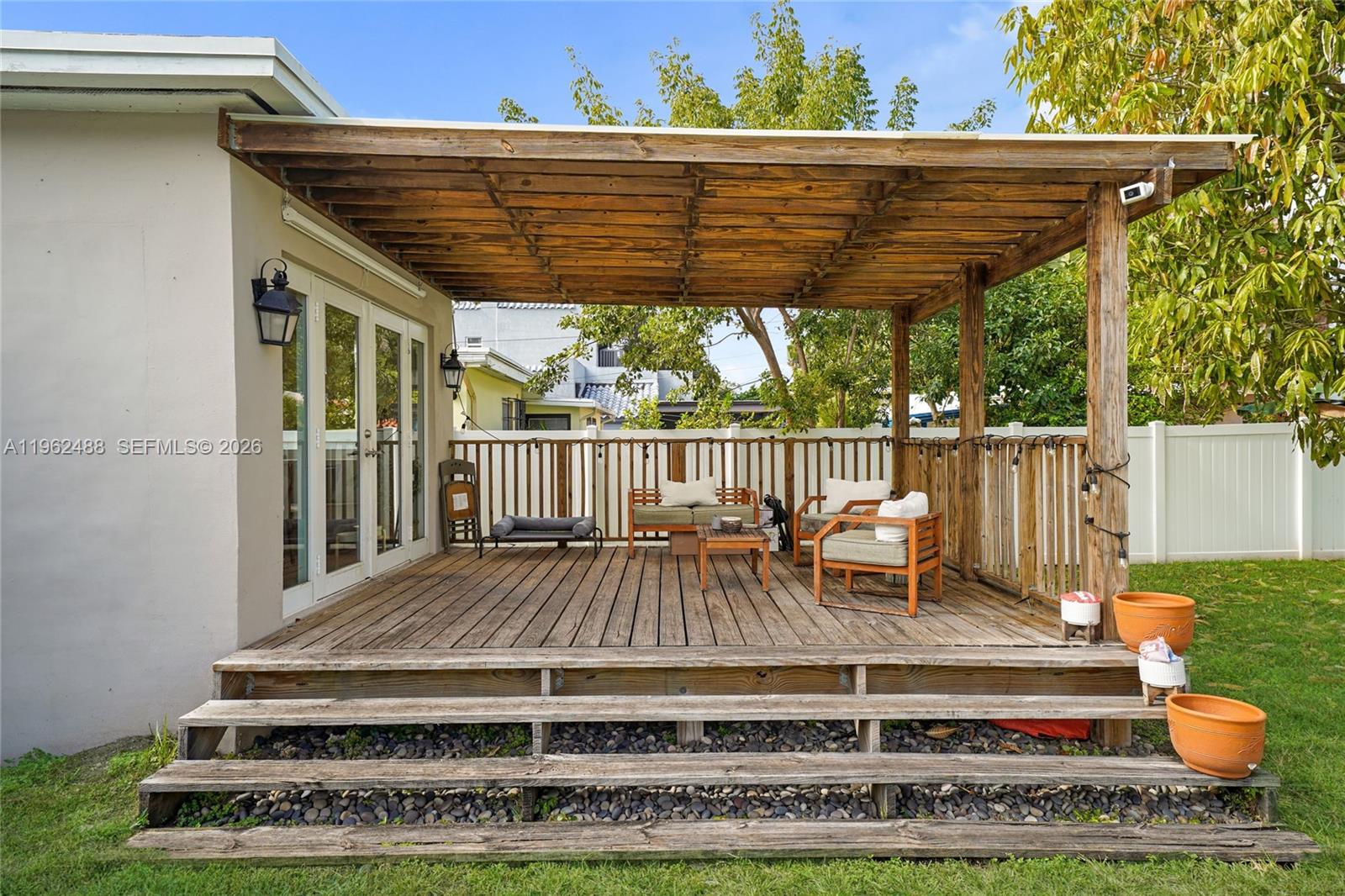 1737 Southwest 11th Street Miami, FL 33135 - Photo 19 of 30 a view of a wooden deck with furniture