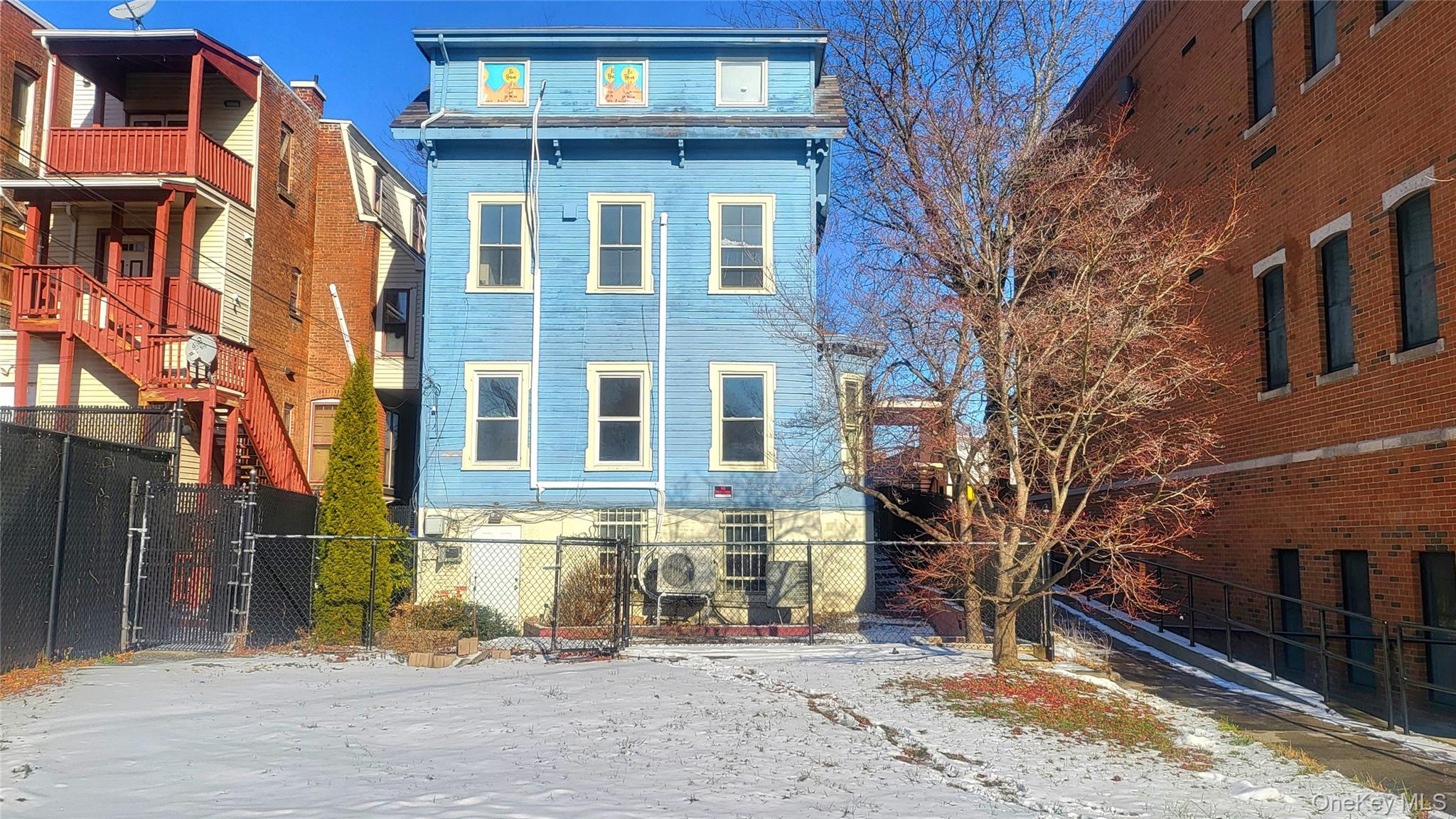 216 Church Street, Unit 2 Poughkeepsie, NY 12601 - Photo 9 of 13 View of snow covered back of property