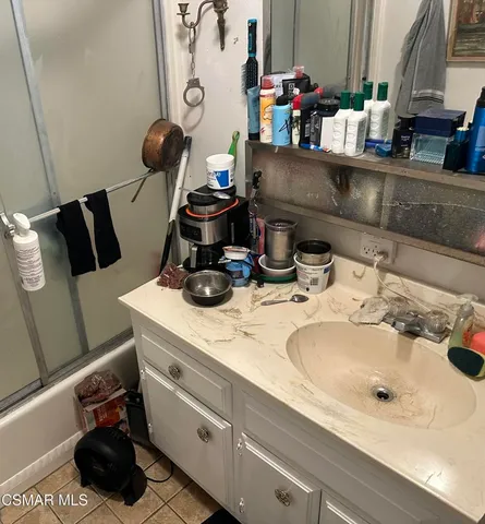 a bathroom with a toilet and a sink