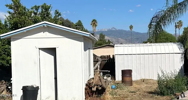 a balcony with chairs