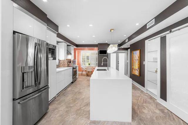 $699,000 | 830 Greensward Court, Unit 214H, Delray Beach, FL 33445