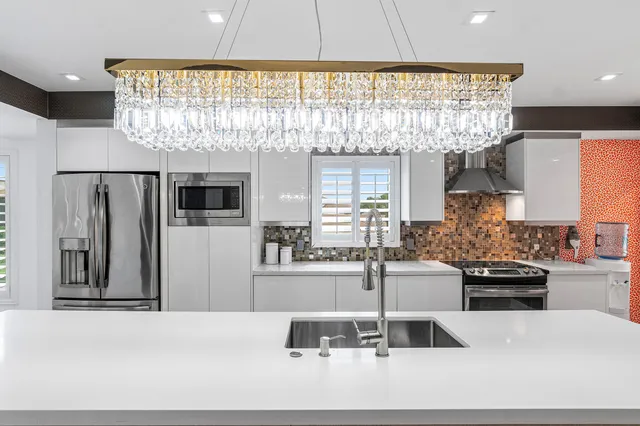 $699,000 | 830 Greensward Court, Unit 214H, Delray Beach, FL 33445