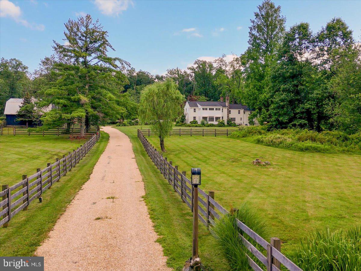 920 Cherry Valley Road Princeton, NJ 08540 - Photo 1 of 58 a view of a lake with a big yard