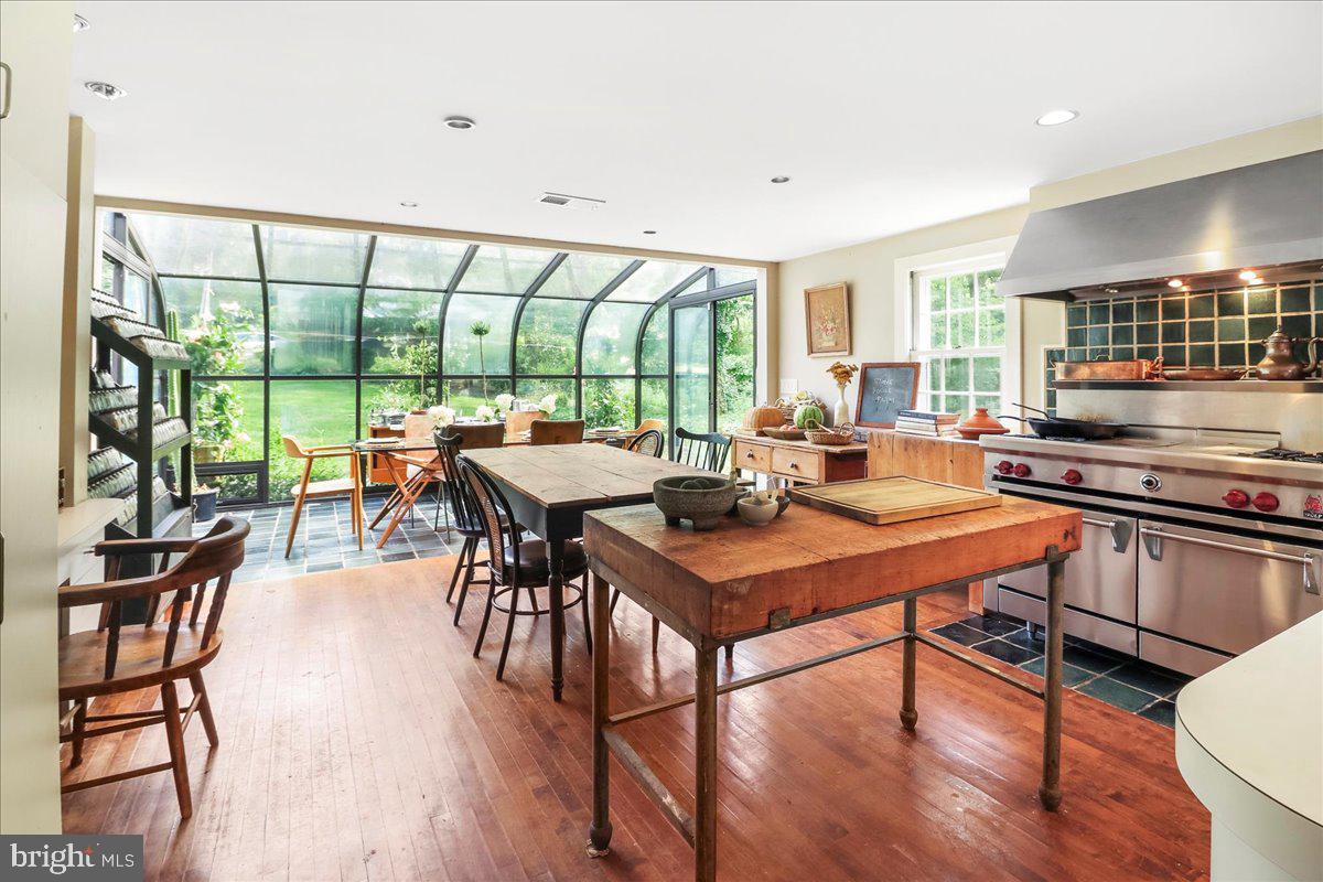 920 Cherry Valley Road Princeton, NJ 08540 - Photo 14 of 58 a view of a dining room with furniture window and wooden floor