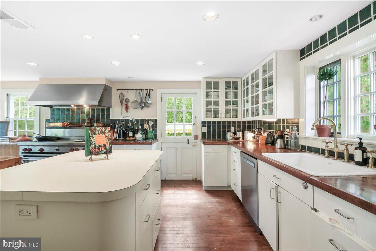 920 Cherry Valley Road Princeton, NJ 08540 - Photo 17 of 58 a kitchen with counter top space sink stove and cabinets