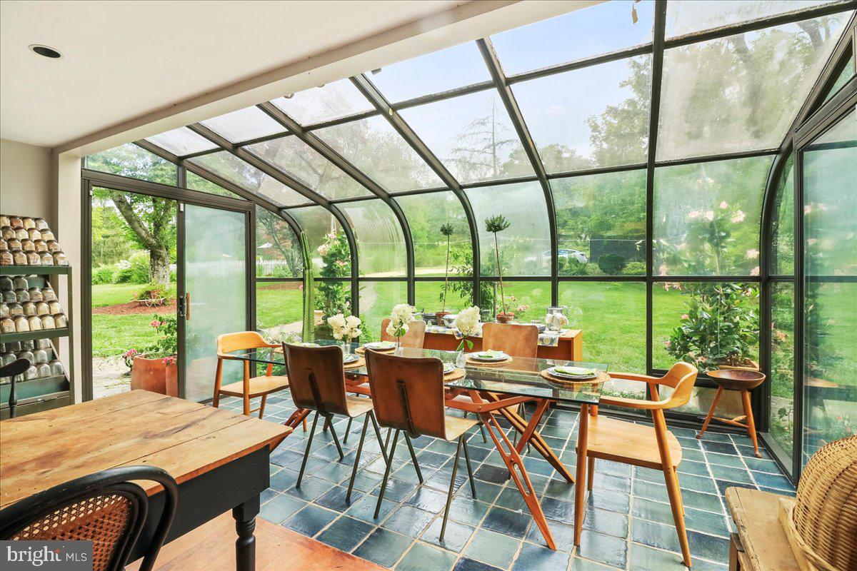 920 Cherry Valley Road Princeton, NJ 08540 - Photo 21 of 58 a view of a dining room with furniture window and outside view