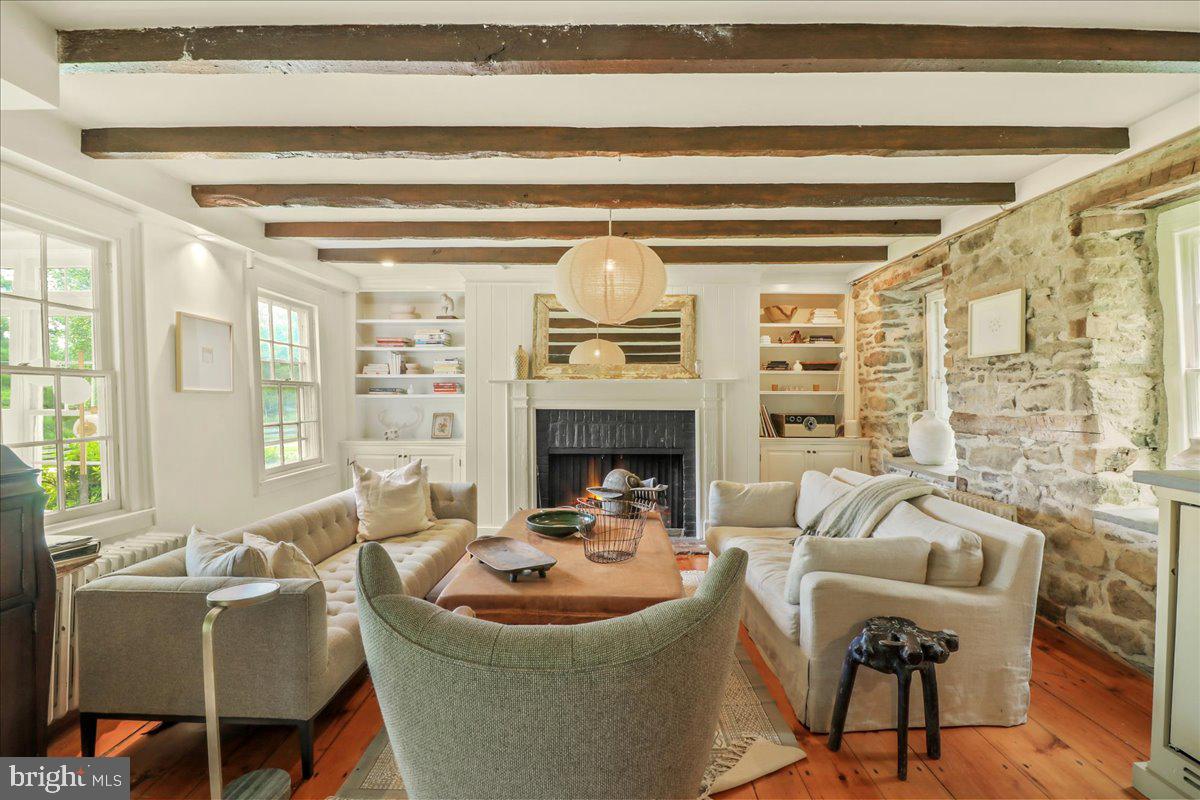 920 Cherry Valley Road Princeton, NJ 08540 - Photo 22 of 58 a living room with furniture and a fireplace