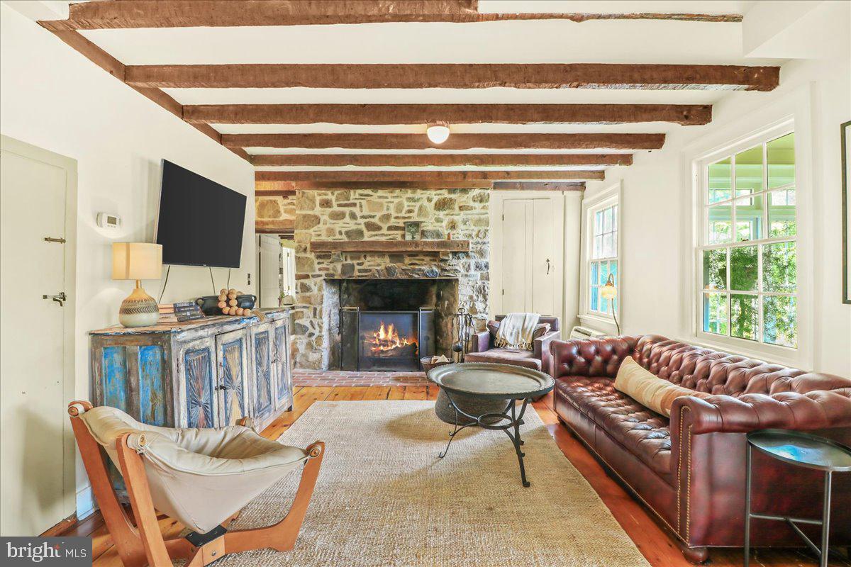 920 Cherry Valley Road Princeton, NJ 08540 - Photo 23 of 58 a living room with furniture and a fireplace