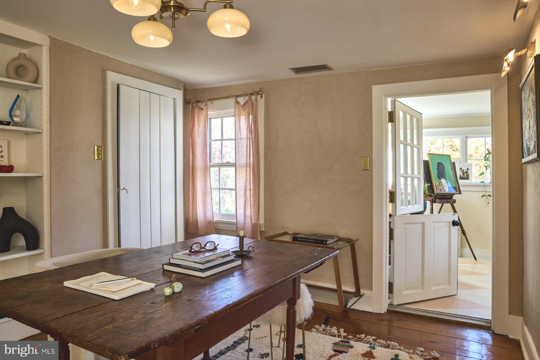 920 Cherry Valley Road Princeton, NJ 08540 - Photo 29 of 58 a view of a dining room with furniture and wooden floor