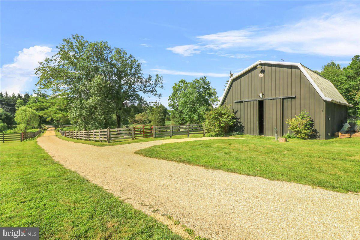 920 Cherry Valley Road Princeton, NJ 08540 - Photo 3 of 58 a view of a terrace with a garden