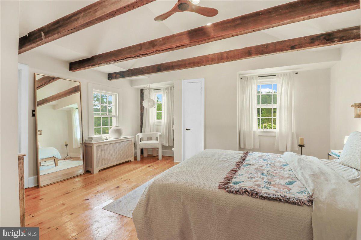 920 Cherry Valley Road Princeton, NJ 08540 - Photo 33 of 58 a bedroom with a large bed and a window