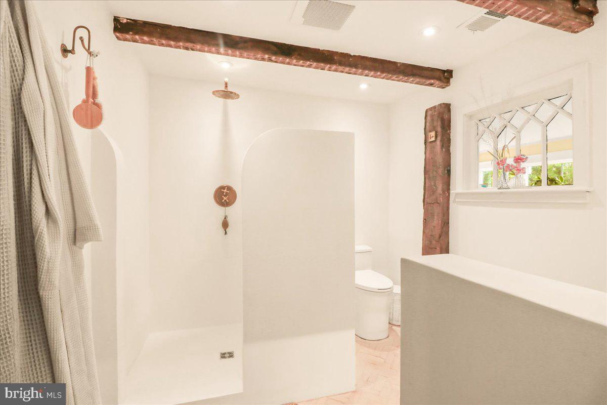 920 Cherry Valley Road Princeton, NJ 08540 - Photo 36 of 58 a bathroom with a shower and a toilet