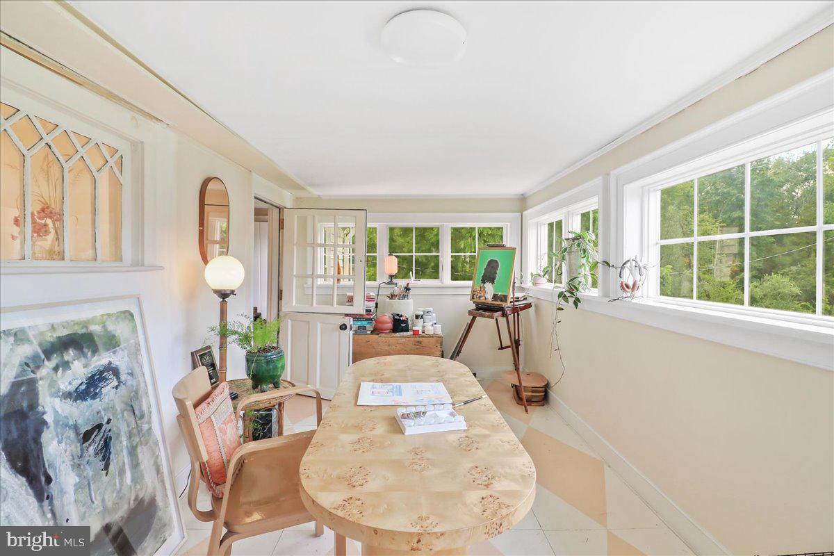920 Cherry Valley Road Princeton, NJ 08540 - Photo 39 of 58 a living room with furniture and a large window