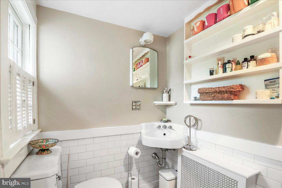 920 Cherry Valley Road Princeton, NJ 08540 - Photo 43 of 58 a bathroom with a sink toilet and mirror