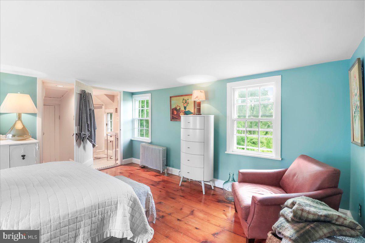 920 Cherry Valley Road Princeton, NJ 08540 - Photo 45 of 58 a bedroom with a bed and a couch