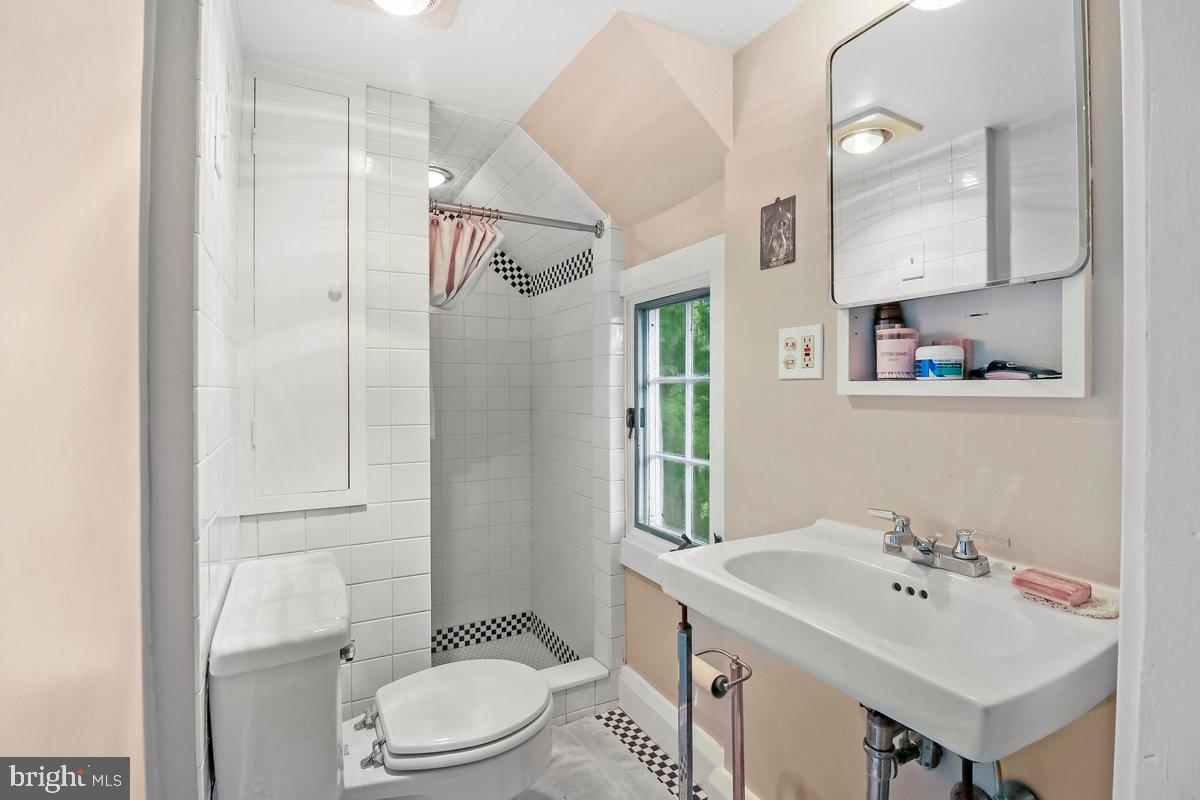 920 Cherry Valley Road Princeton, NJ 08540 - Photo 47 of 58 a bathroom with a sink toilet and shower