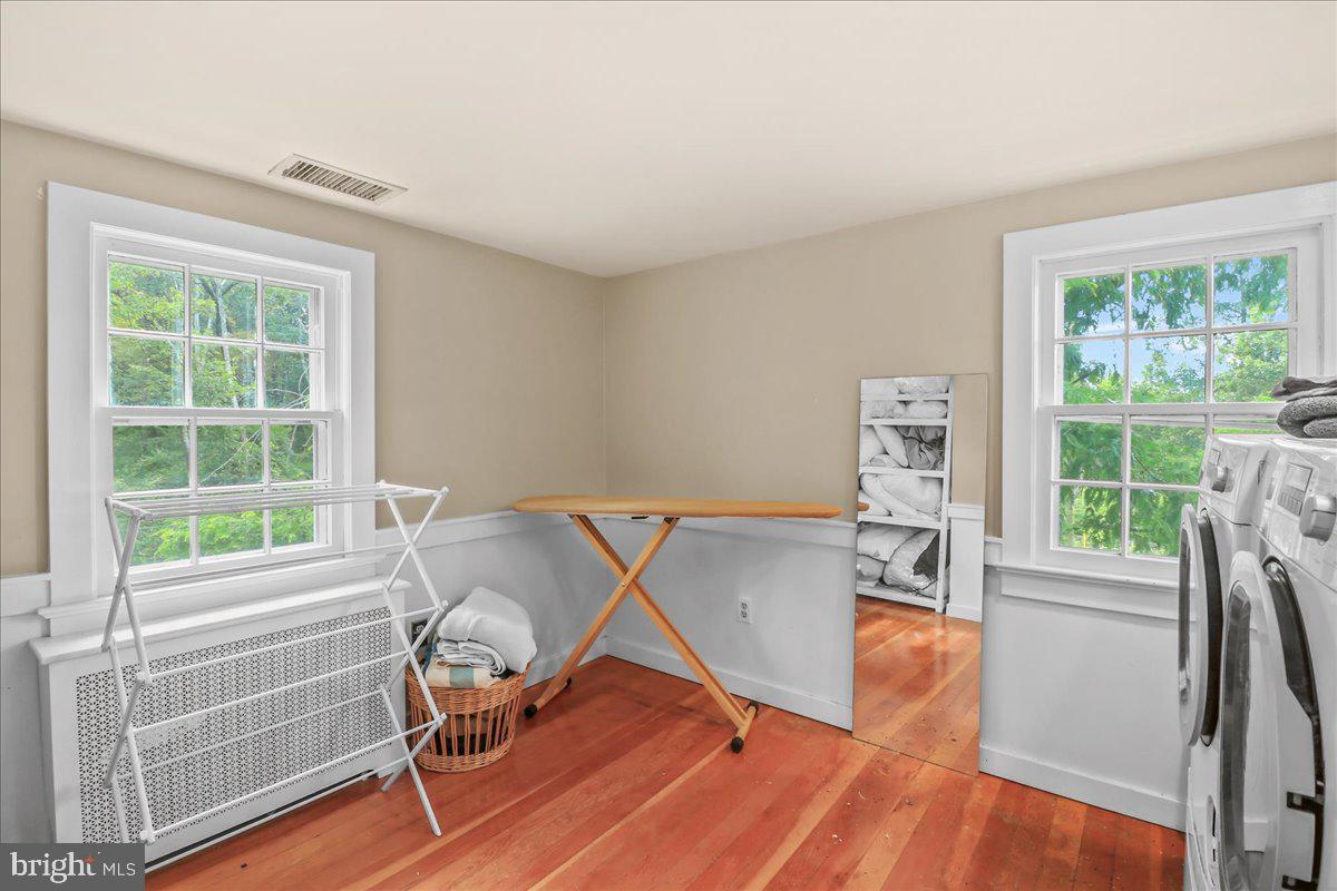 920 Cherry Valley Road Princeton, NJ 08540 - Photo 49 of 58 a view of a workspace with furniture and a window