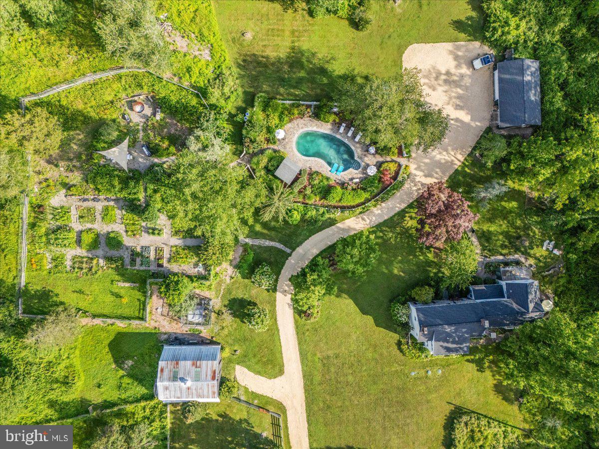 920 Cherry Valley Road Princeton, NJ 08540 - Photo 56 of 58 an aerial view of a house with a yard and swimming pool