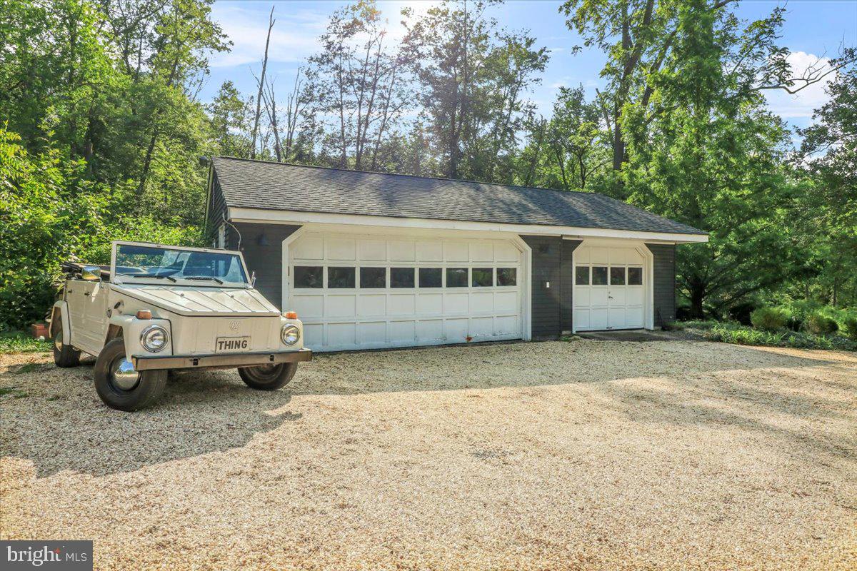 920 Cherry Valley Road Princeton, NJ 08540 - Photo 8 of 58 a car parked in front of house