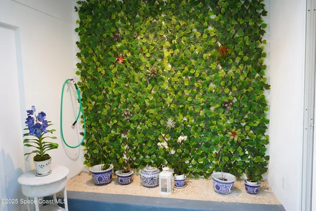 a view of a table and chair in the patio