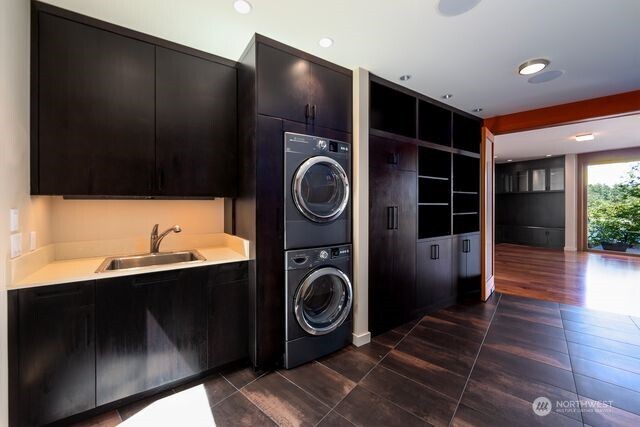 630 Harrison Street Friday Harbor, WA 98250 - Photo 23 of 37 a view of walk in closet and wooden floor